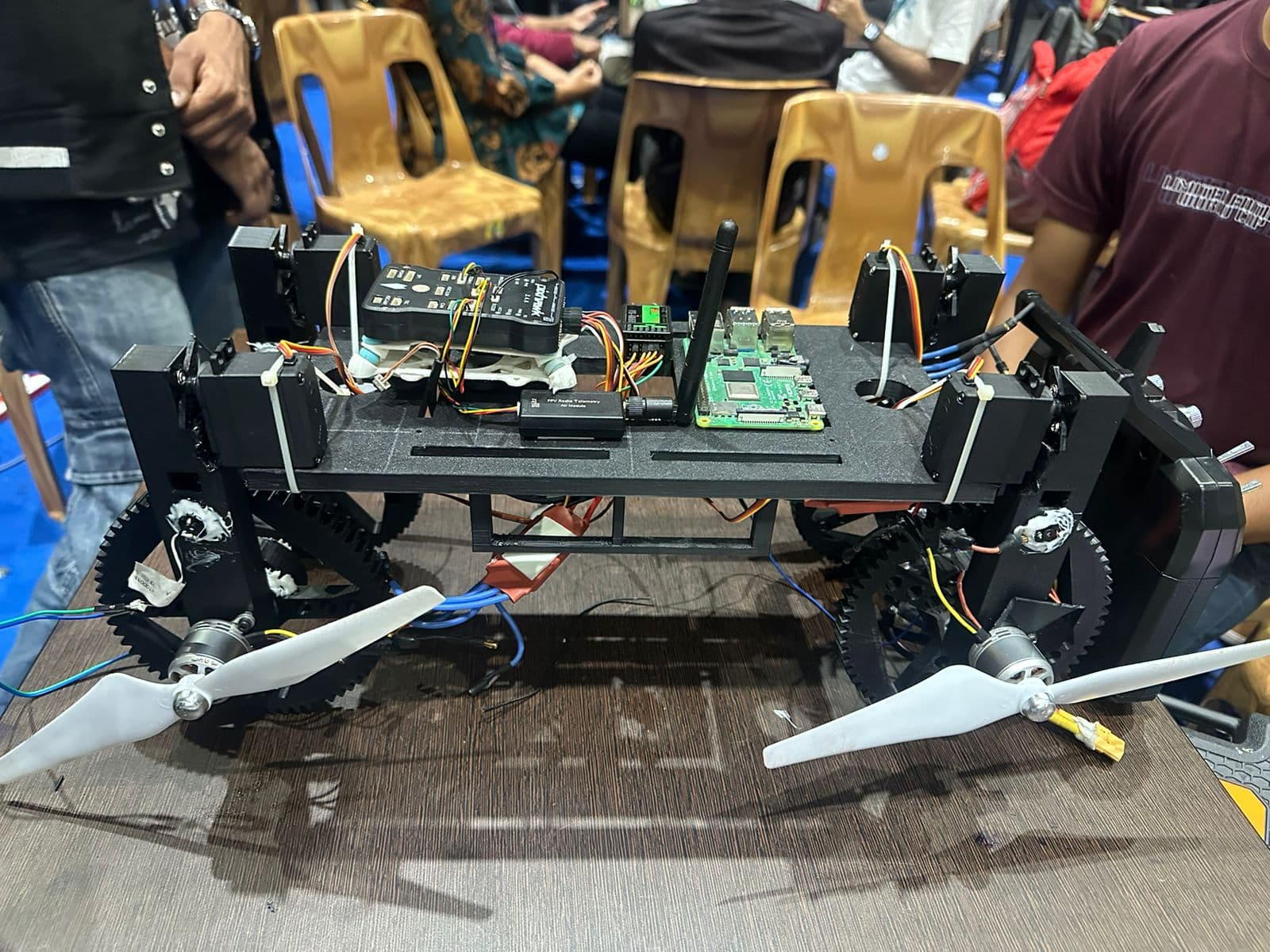 Transformation Drone — rover mode, driving on geared hubs